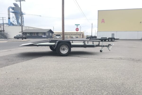 A trailer is parked in the parking lot.