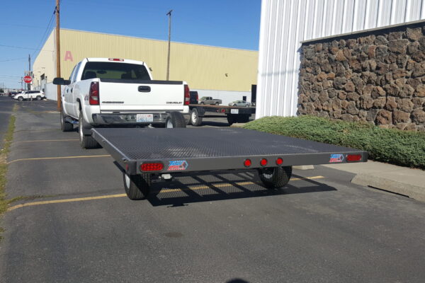 A truck is parked in the parking lot