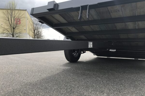 A trailer that has been placed on the ground.