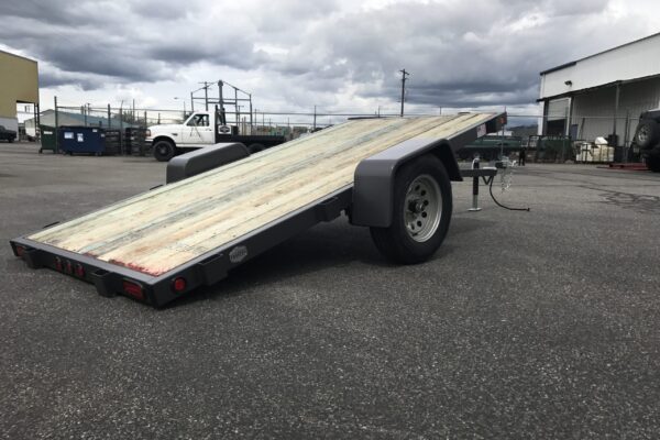 A trailer with a ramp attached to it